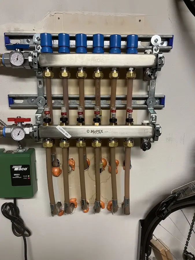 Plumber performing Water Heater Repair at a residential property in Centre